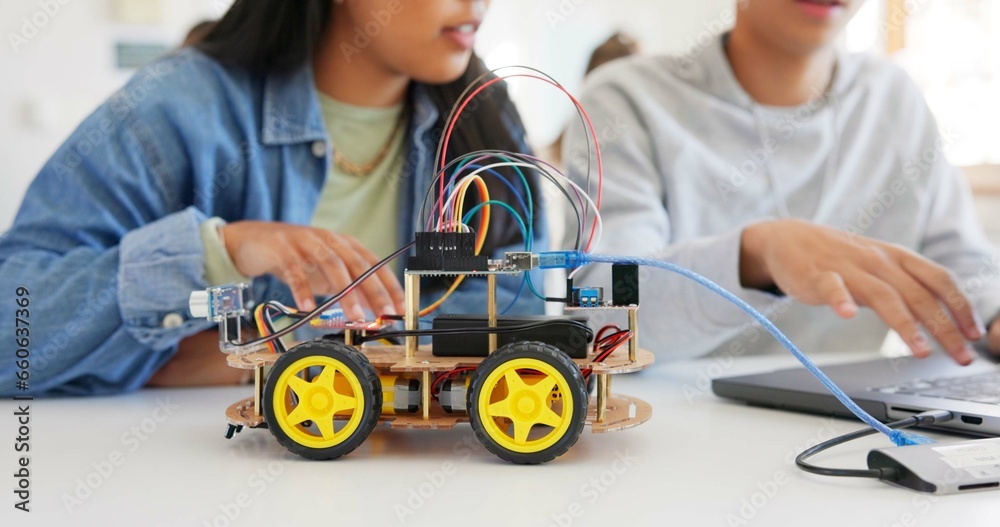 Fototapete Robotics, education and hands of children at school learning about coding, robot or car toy in class. Kids in classroom for technology, electronics or science for development, innovation and teamwork