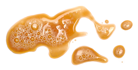 Spilled dark stout beer puddle  with foam, isolated on white, top view, clipping path 