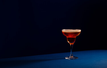  Moody Drink on dark blue background