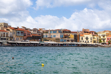 Obraz premium View from the Old Venetian Port of Chania. Beautiful, colorful buildings in the old town of Chania