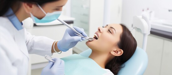 Close-up of a patient being examined by a dentist,