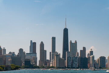 Fototapeta premium A view of Downtown skyscrapers of Chicago skyline panorama over Lake Michigan at daytime, Chicago, Illinois, USA