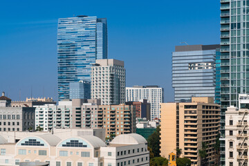 Fototapeta premium Cityscape of Los Angeles downtown at summer day time, California, USA. Skyscrapers of panoramic city center of LA.