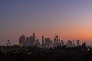 Fototapeta na wymiar Skyline of Los Angeles downtown at summer sunset, California, USA. Skyscrapers of panoramic city center of LA.