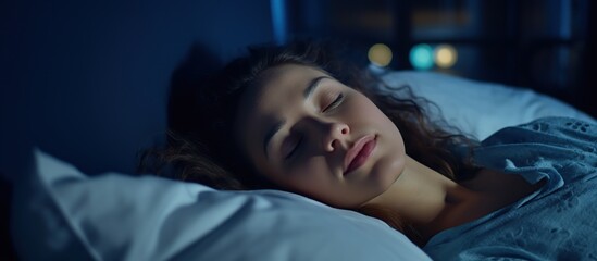 Young Woman Sleeping In Bed. Portrait of Beautiful Woman Resting in Bed.