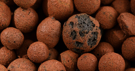 Clay pebbles, expanded clay, weed protection, ornamental value, orchard and garden substrates. High quality 4k footage