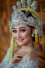 Amazing smiling bride. Traditional Javanese Bridal Portrait. Indonesian bride. Wedding day bride in wedding dress. Beautiful bride. Beautiful model. Javanese wedding dress. Akad Nikah Dress.