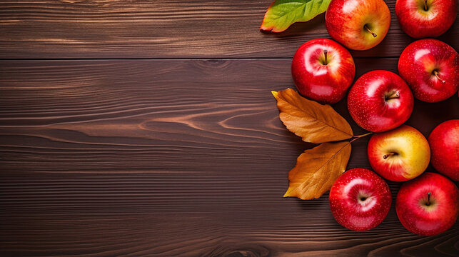 fresh red apples on an wooden ground