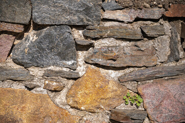 Stone wall, stone wall, limestone, rough stone wall background and wallpaper