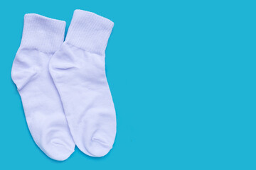 White socks on blue background.