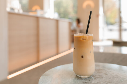 Close-up of a glass of iced coffee on a table