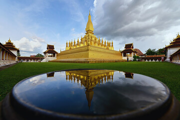 Pha That Luang (Great Golden Stupa) and reflection, Vientiane, Laos