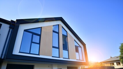 New build single family house. Suburban area with modern geometric family house.