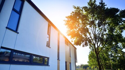 New build single family house. Suburban area with modern geometric family house.