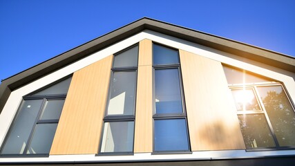 New build single family house. Suburban area with modern geometric family house.