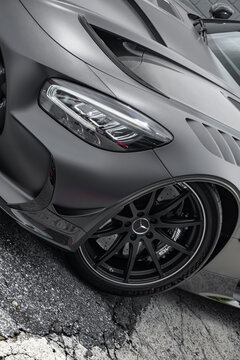 Mercedes Benz AMG GT Black Series matte black front end view, wheel and headlight focused shot - High Resolution Image