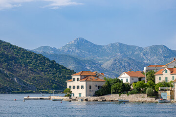 Fototapeta na wymiar Waterfront view of historic town Lepetani in Montenegro