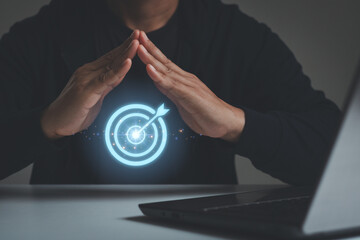 Business achievement objective target goal concept. Businessman gesture protecting virtual blue...