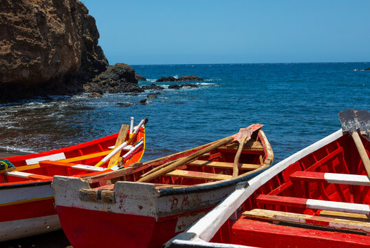 Colourful fishing boats on Fisherman Bay beach in Cidade Velha (Old City) on the southern part of the island of Santiago, Cape Verde