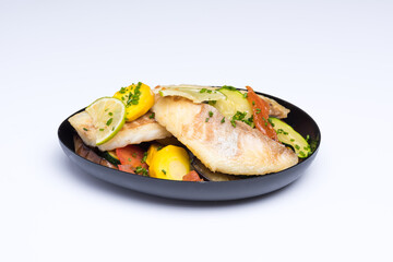 Dorade dans sont lit de légumes gourmand et à emporter