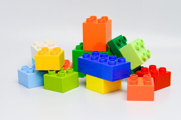 Pile plastic toy bricks of construction.