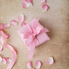 gift box and pink rose petals