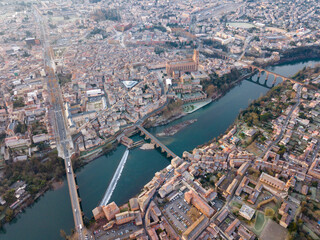 Aerial view of French city of Albi on bank of Tarn river in autumn day..