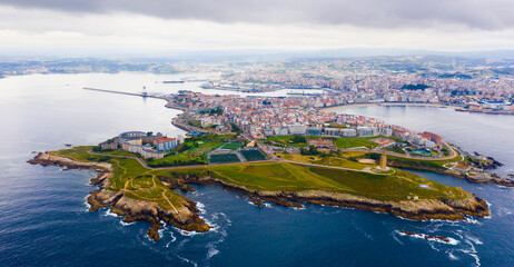 Tower of Hercules (Torre de Hercules) lighthouse located in the city of La Coruna. Galicia, Spain - obrazy, fototapety, plakaty