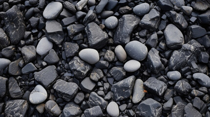 Fototapeta na wymiar Texture of Lava Rock with Irregular Shapes, showcasing an array of shapes and sizes from small pebbles to larger boulders. Its rough and textured surface adds dimension and texture to any