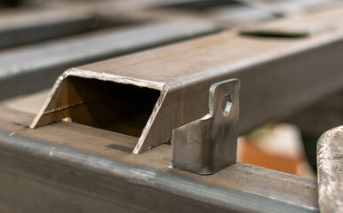 Welded metal structure of structural profiles