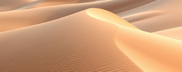 Closeup of dynamic sand dunes, their textures and shapes constantly changing as wind continues to shape them into new forms.