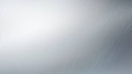 Closeup of frosted aluminum, showcasing a bright silver color with a frosted effect that diffuses light. The texture is smooth to the touch and has a reflective quality.