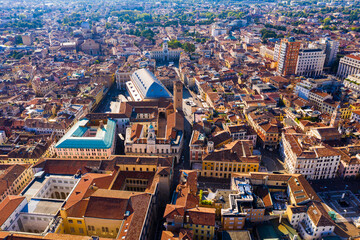 Aerial view of historical center of Italian city of Padua with blue roof of Palazzo della Ragione on sunny day