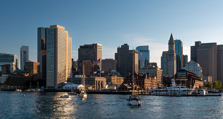 A view of Boston from Boston Harbor late in the afternoon on. a sunny summer day