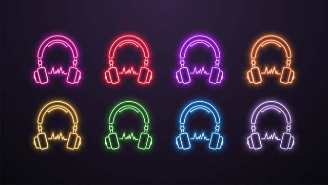 A set of 8 neon bright glowing shiny icons with headphones in the colors blue, yellow, green, orange, purple, pink, white and red on a dark background. A concept for music and cyber sports.