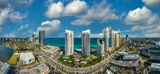 Fotobehang Atlantische weg Sunny Isles Beach city with luxurious highrise hotels and condo buildings and busy ocean drive on Atlantic coast. American tourism infrastructure in southern Florida