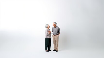 Portrait of asian elderly talking together isolated over white background.