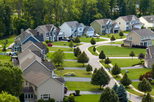 Top view of expensive two story private houses in Rochester NY suburbia. New family homes in upscale community. Real estate development in american suburbs