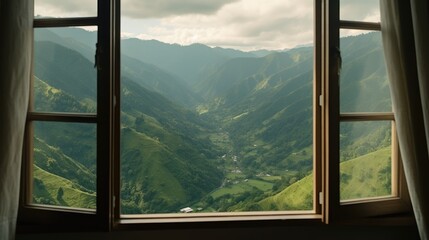 View from the open window with views of green mountains