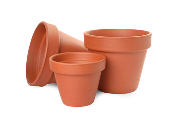 Empty clay flower pots isolated on white