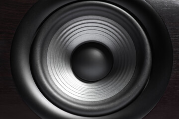 One wooden sound speaker as background, closeup