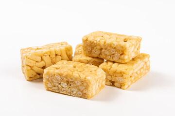 Chinese traditional dessert caramel treats or sachima isolated on white background.