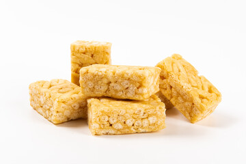 Chinese traditional dessert caramel treats or sachima isolated on white background.