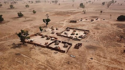 Rural nomadic village in Nigeria, West Africa - aerial reveal