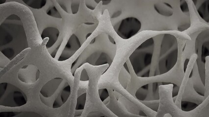 Closeup shot of spongy bone tissue growing in slow motion, scanning electron microscope, 3d animation.