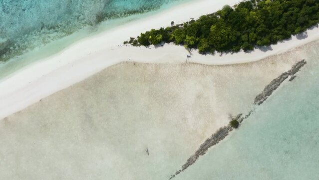 Beautiful sandy beach and blue sea. Timba Timba islet. Tun Sakaran Marine Park. Borneo, Sabah, Malaysia.