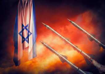 Missiles launched next to the Israeli flag. Concept of the conflict between Israel and Palestine