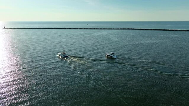 Tracking boats as the leave Muskegon Channel.