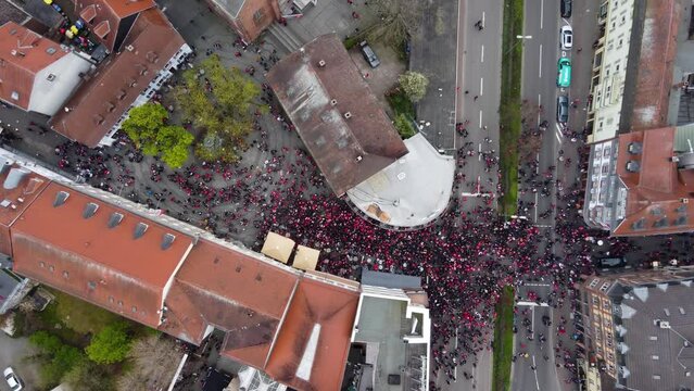 Audience and fans of FCK Football Club celebrating at street bars of Kaiserslautern city, Germany. Aerial bird's-eye