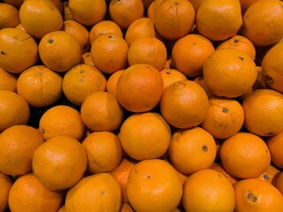 Pile of fresh oranges from the market.